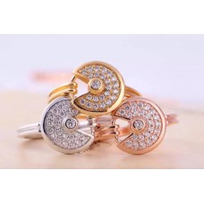 Amulette de Cartier gyémántgyűrű sárgaaranyban, fehéraranyban és rozéaranyban