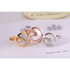 Amulette de Cartier fehér gyöngyház gyűrű gyémánttal sárgaaranyban fehérarany és rozéarany